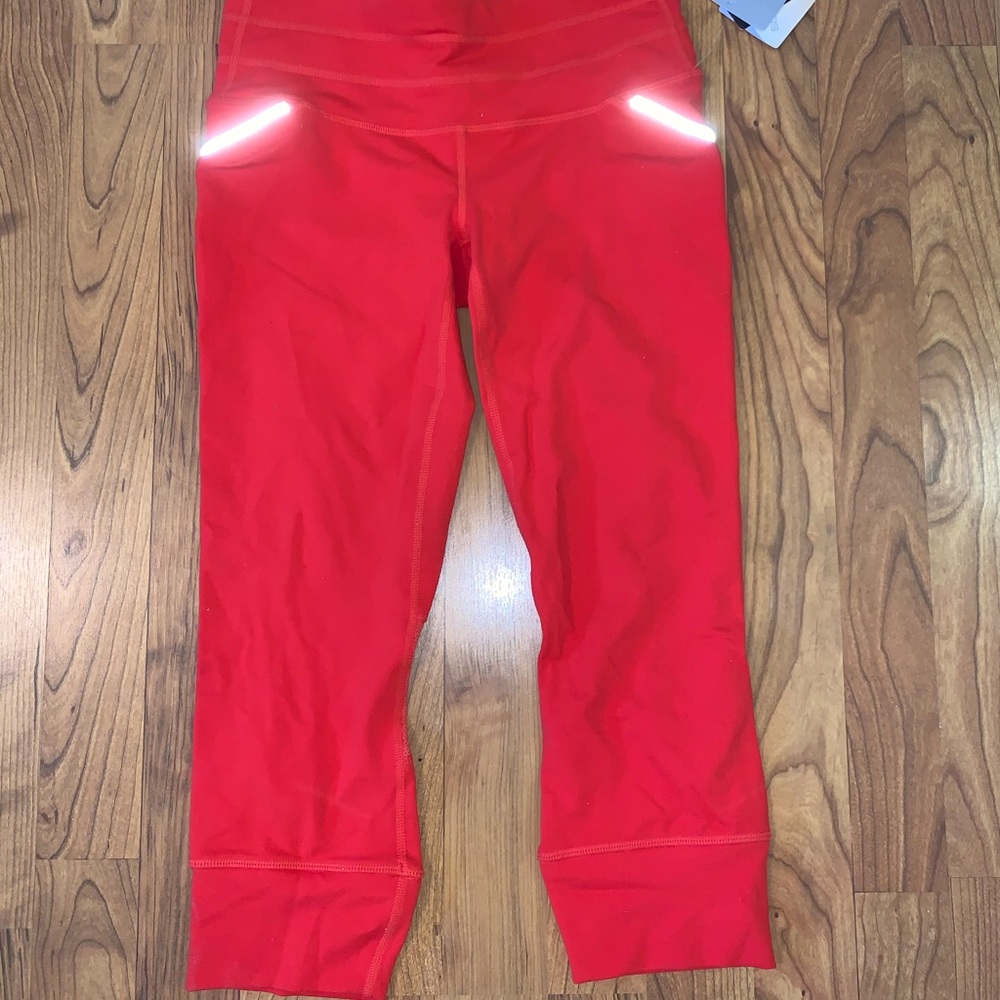 Athleta Orange Knee Length Leggings